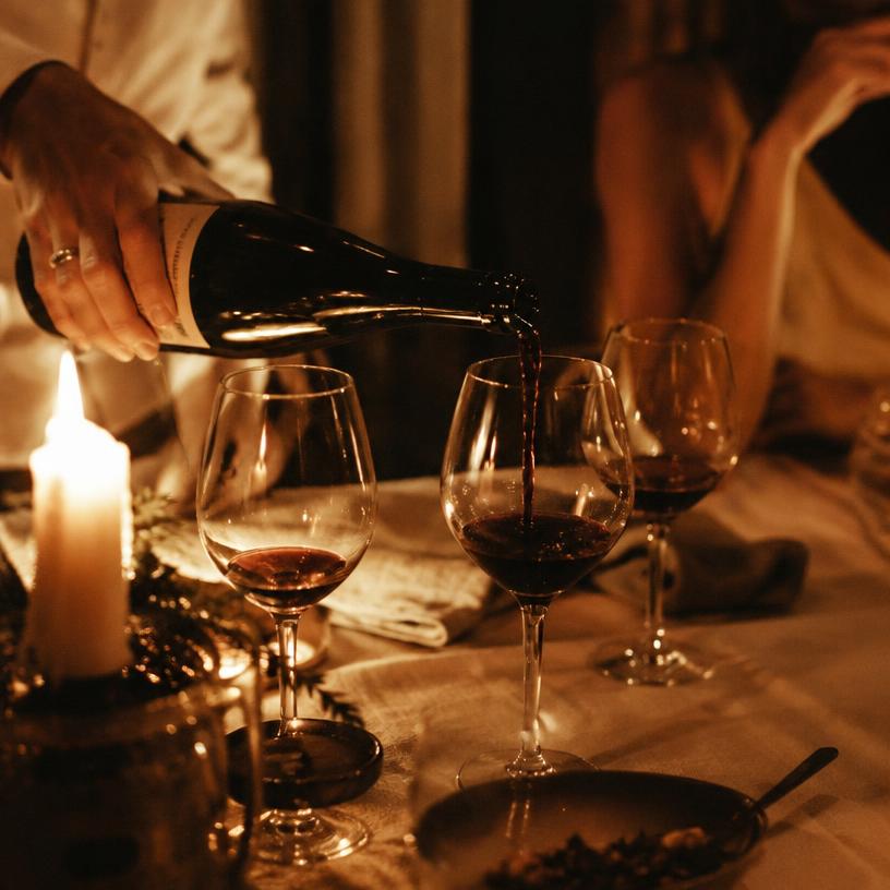 Wine poured by candlelight